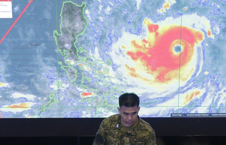 Ferocious typhoon plows through rain-soaked Philippines | The Seattle Times