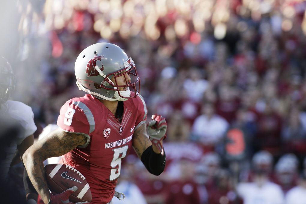 Washington State wide receiver Gabe Marks (9) runs with the ball during the first half. (Young Kwak / AP)