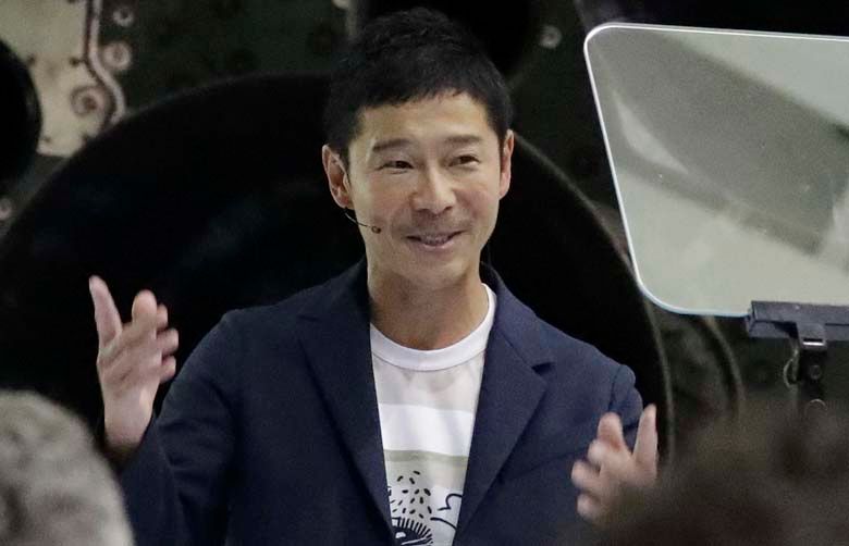 Japanese billionaire Yusaku Maezawa speaks after SpaceX founder and chief executive Elon Musk announced him as the person who would be the first private passenger on a trip around the moon, Monday, Sept. 17, 2018, in Hawthorne, Calif. (AP Photo/Chris Carlson)