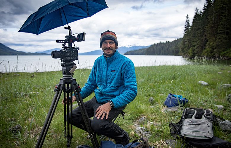 Me (Nate Dappen) filming near our campsite on Etolin Island. It rained almost every day on this trip and keeping my camera gear dry was a challenge.