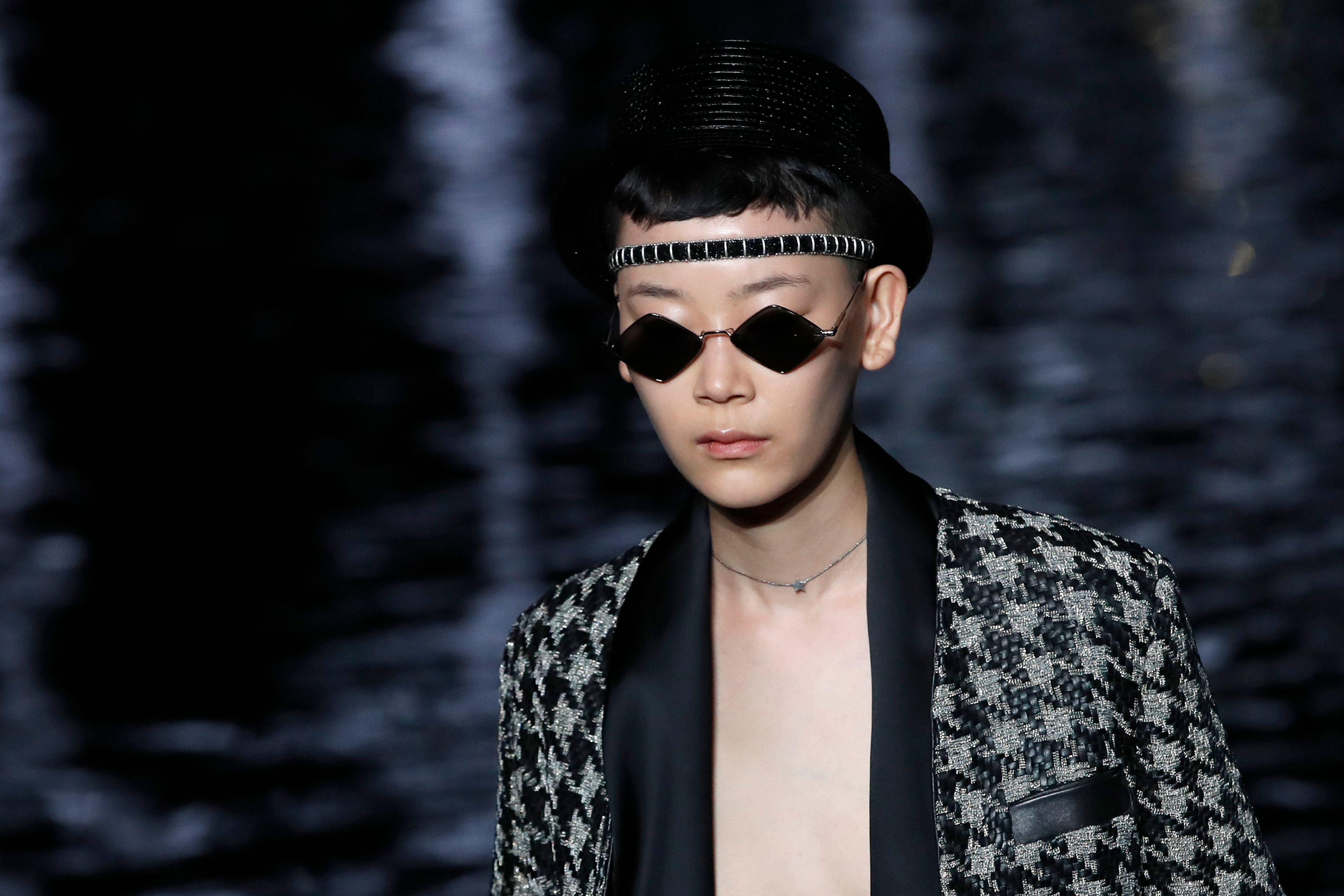 Starry Saint Laurent show in Paris sees models walk on water The