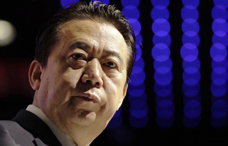 FILE – In this July 4, 2017, file photo, Interpol President Meng Hongwei delivers his opening address at the Interpol World congress, in Singapore. Chinese authorities say they are investigating the former president of Interpol for bribery and other crimes and indicate that political transgressions may have also landed him in trouble. In a statement posted on a government website Monday, Oct. 8, 2018, the authorities said Meng Hongwei, China’s vice minister for public security, was being investigated due to his own “willfulness and for bringing trouble upon himself.” (AP Photo/Wong Maye-E, File) TKSK102 TKSK102