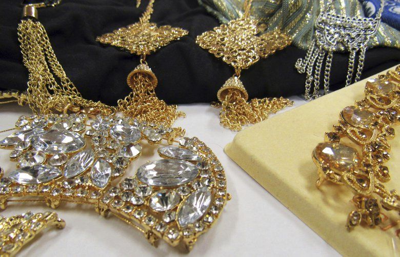 This Sept. 20, 2018 photo provided by the Center for Environmental Health (CEH) in Oakland, Calif., shows jewelry items loaded with the toxic metal cadmium they bought from the shelves of national retailers, at the center in Oakland. Testing shows jewelry loaded with the toxic metal cadmium is on the shelves of national retailers including Ross, Nordstrom Rack and Papaya. Testing done for CEH showed some jewelry sold with women’s apparel was nearly pure cadmium. Extended exposure to cadmium can cause cancer and reproductive harm. (Center for Environmental Health via AP) LA301 LA301