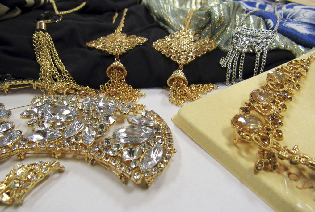 This Sept. 20, 2018, photo provided by the Center for Environmental Health shows shows jewelry items loaded with the toxic metal cadmium that were bought from the shelves of national retailers, at the center in Oakland, Calif. (Center for Environmental Health via AP)