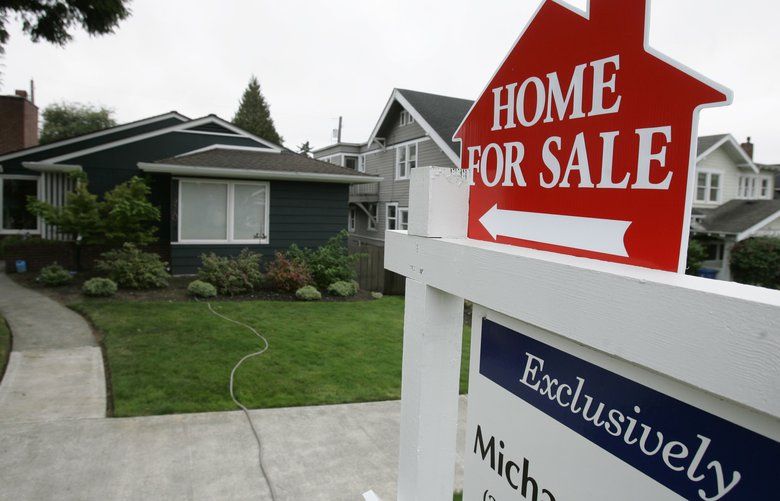 FILE-   This Tuesday, Sept. 25, 2007 file photo shows a home for sale in Tacoma, Wash. Sometimes home sellers hoping to close a deal agree to purchase home warranties to give their buyers peace of mind.    (AP Photo/Ted S. Warren, FILE) NYLS305