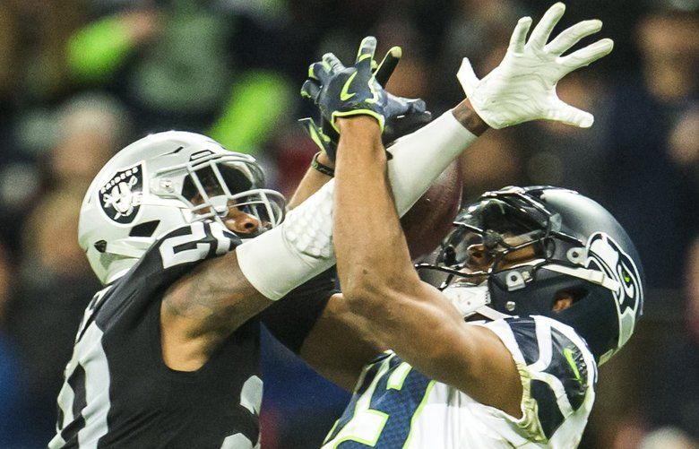 Seattle Seahawks' Doug Baldwin, right, bumps helmets with a teammate  against the San Francisco 49ers in the second half of an NFL football game,  Sunday, Nov. 22, 2015, in Seattle. (AP Photo/Elaine