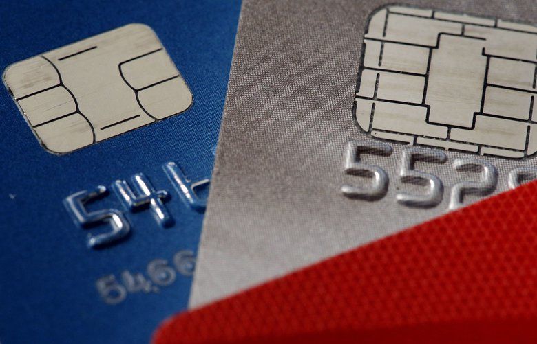 FILE- This June 10, 2015, file photo shows chip credit cards. (AP Photo/Matt Rourke, File) 