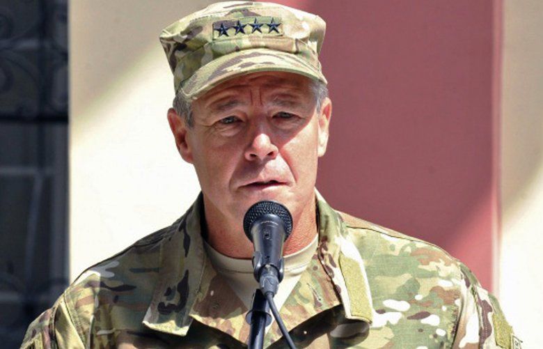In this September 2, 2018 photo, provided by the U.S. Air Force, U.S. Army Gen. Scott Miller, commander of U.S. and NATO troops in Afghanistan, delivers remarks during the Resolute Support mission change of command ceremony in Kabul, Afghanistan. Afghan officials said Thursday, Oct. 18, 2018 that three top Kandahar province officials have been killed by their own guards in an attack at a security meeting that also wounded two U.S. troops. A Taliban spokesman who claimed responsibility for the attack tells The Associated Press that Miller, was the target. NATO officials say Miller escaped unharmed. (U.S. Air Force/Tech. Sgt. Sharida Jackson, via AP) CAITH101 CAITH101