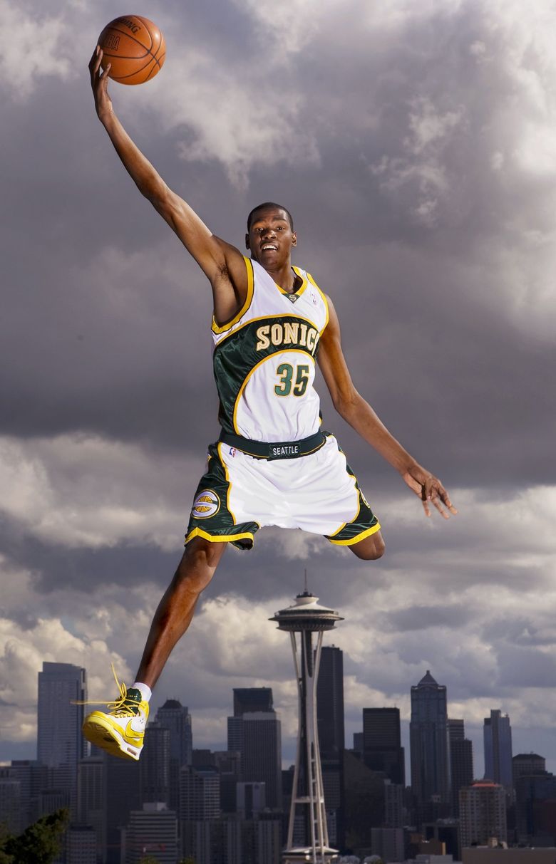 SEATTLE – JANUARY 30: The Seattle Sonics mascot Squatch dunks during an  intermission in the game against the Sacramento Kings at Key Arena on  January 30, 2003 in Seattle, Washington. The Kings