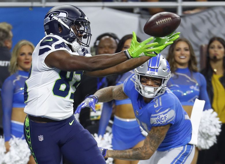 Seattle Seahawks wide receiver David Moore (83) scores a touchdown