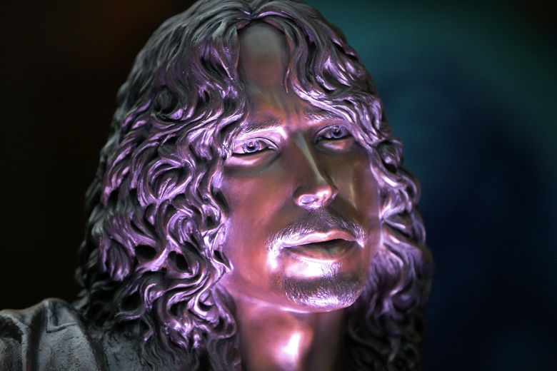 The statue of Soundgarden frontman Chris Cornell on Sunday outside MoPOP in Seattle. (Ken Lambert / The Seattle Times)