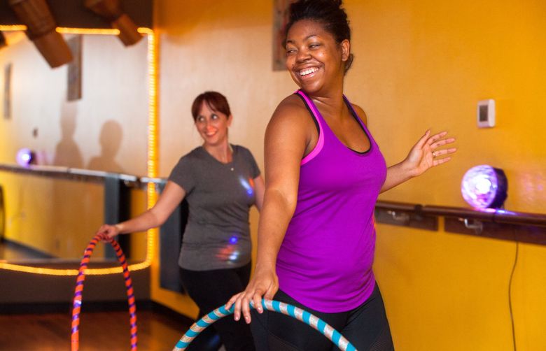SEATTLE – Ashley Deas, of Seattle, Wash., attends her second Hoopnotica “Hoop Love” class at Compfit Studio on Tuesday, Sept. 25, 2018. – 092518