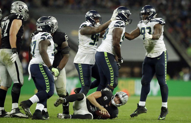 SEA 27, OAK 3: Seahawks roll behind Wilson's 3 TDs; Raiders QB