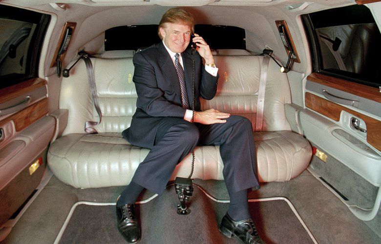 FILE — Donald Trump in a limousine in New York, Dec. 9, 1999. The president has long sold himself as a self-made billionaire, but a New York Times investigation found that he received at least $413 million in today’s dollars from his father’s real estate empire, much of it through tax dodges in the 1990s. (Jeffery A. Salter/The New York Times) XNYT237 XNYT237