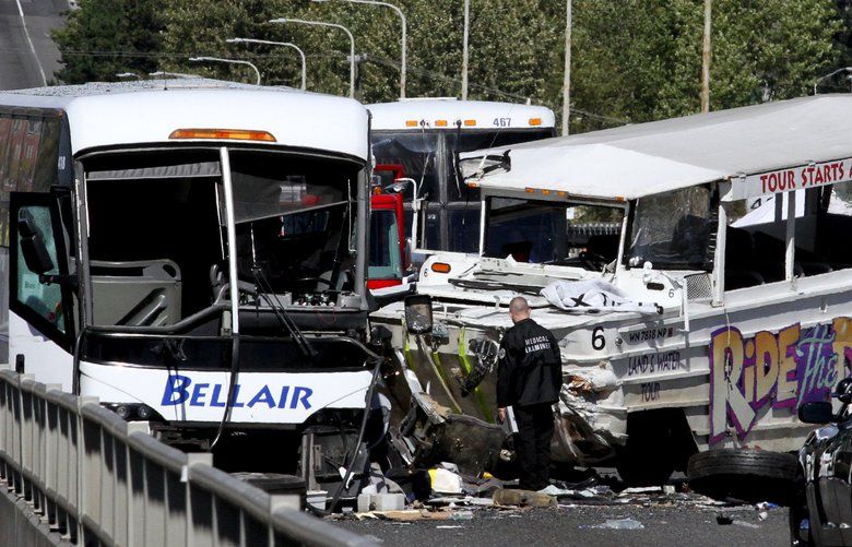 The medical examiner investigates the scene of the fatal crash on the Aurora Bridge between a bus and a Ride the Ducks and a bus crashed on Aurora Bridge, Thursday, Sept. 24, 2015.

two other vehicles involved
fatalities and many injuries