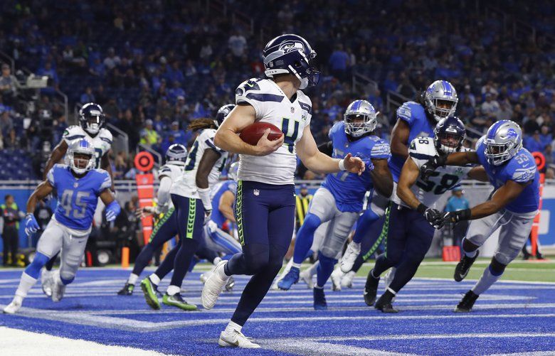 Seattle Seahawks punter Michael Dickson (4) wears an international flag  decal and a Crucial Catch logo on his helmet during an NFL football game  against the New Orleans Saints, Sunday, Oct. 9