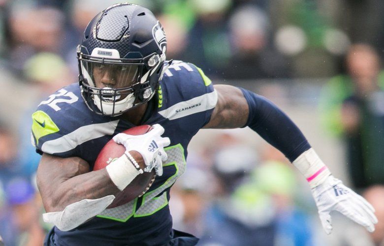 Seattle Seahawks running back (27) Mike Davis heads for the field before  the start of a game against the Los Angeles Chargers played at the StubHub  Center in Carson, CA on Saturday