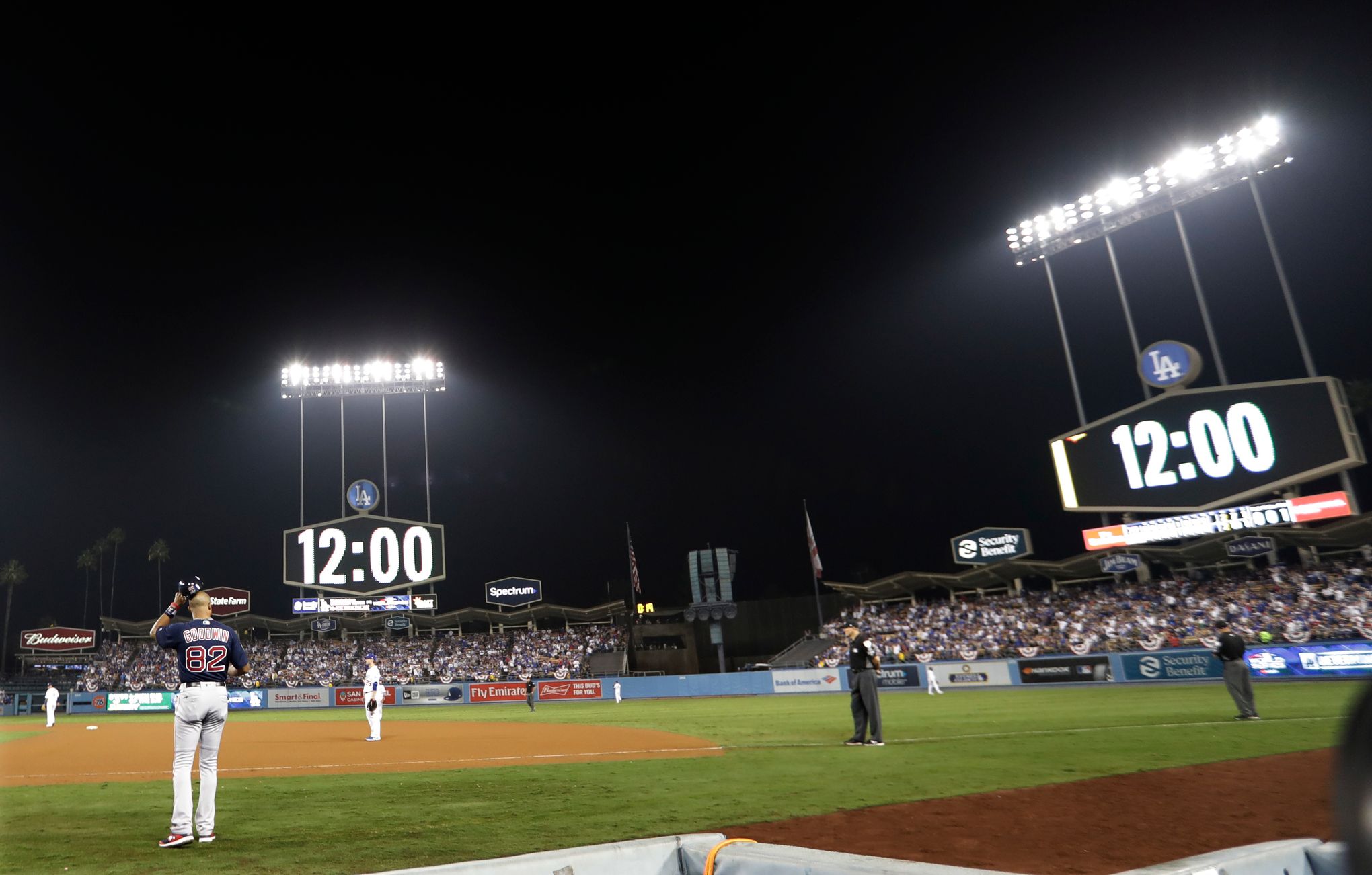 Red Sox reliever Nathan Eovaldi throws a strike to Dodgers Yasiel