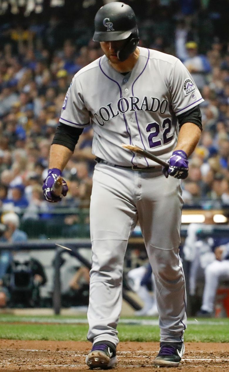 Rockies' Chris Iannetta breaks bat over his leg after striking out in the  7th inning of Game 2 – The Denver Post