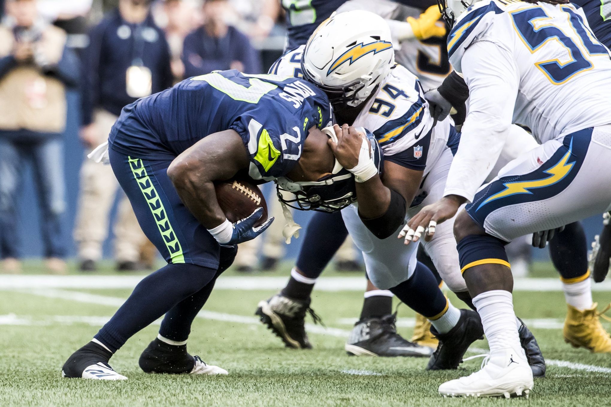 Seattle Seahawks running back (27) Mike Davis heads for the field