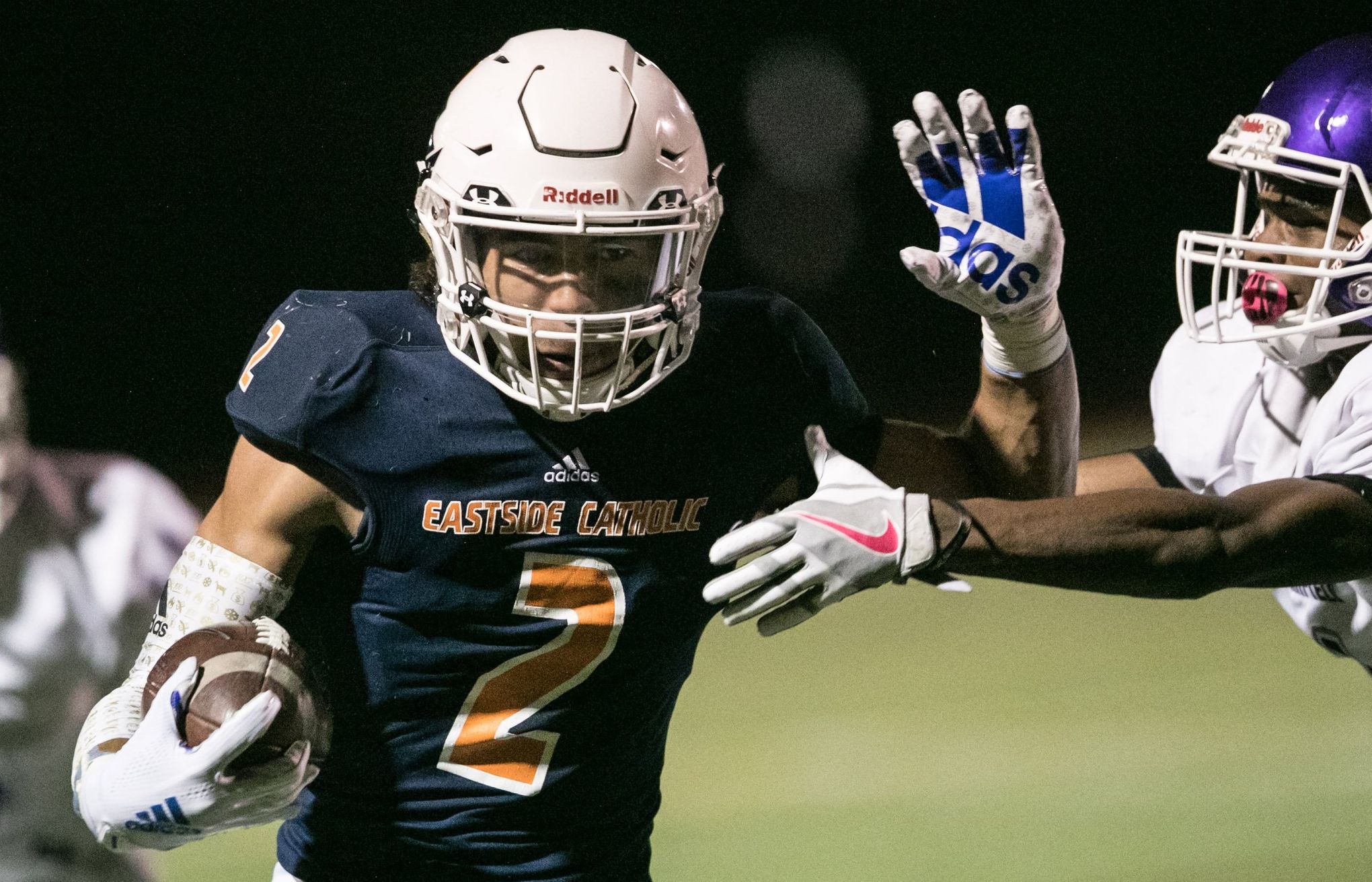 Eastside Catholic's Sam Adams II isn't much into playing defense or on the  line like the rest of his family