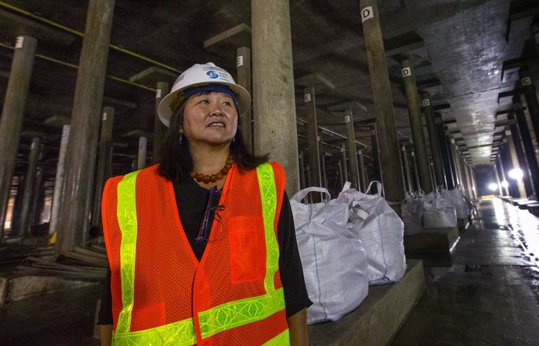Mami Hara, CEO and general manager at Seattle Public Utilities, stands inside the Beacon Reservoir in Seattle Thursday, August 10, 2017.  Beacon Reservoir, a vast, underground water storage facility, is getting seismic retrofitting.  The reservoir holds 50 million gallons of water.  It has been in service since 2010 and is Seattle’s biggest single cell reservoir.