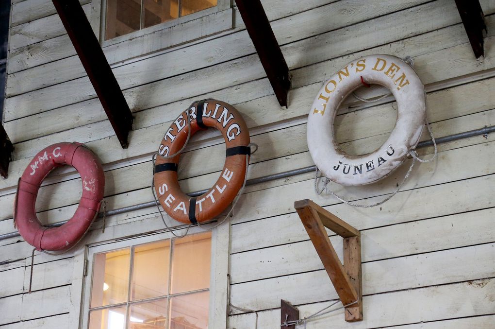 Vintage life rings hang on a wall at Jensen. (Greg Gilbert / The Seattle Times)