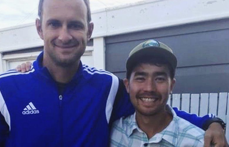 In this October 2018 photo, American adventurer John Allen Chau, right, stands for a photograph with Founder of Ubuntu Football Academy Casey Prince, 39, in Cape Town, South Africa, days before he left for in a remote Indian island of North Sentinel Island, where he was killed. Chau, who kayaked to the remote island populated by a tribe known for shooting at outsiders with bows and arrows, has been killed, police said Wednesday, Nov. 21. Officials said they were working with anthropologists to recover the body. (AP Photo/Sarah Prince) XDEL101M XDEL101M