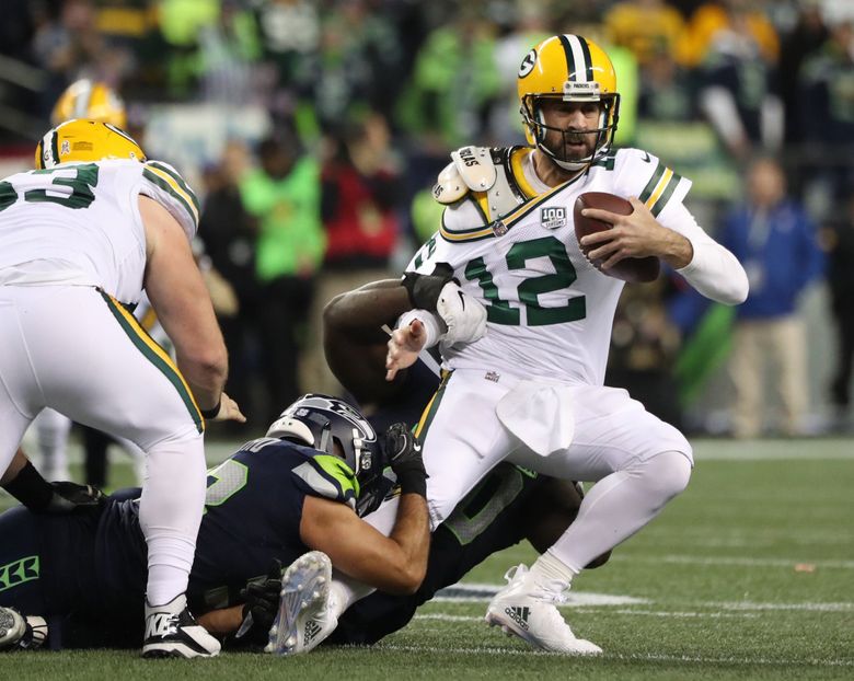 Aaron Rodgers stays cool to guide Packers past Seahawks