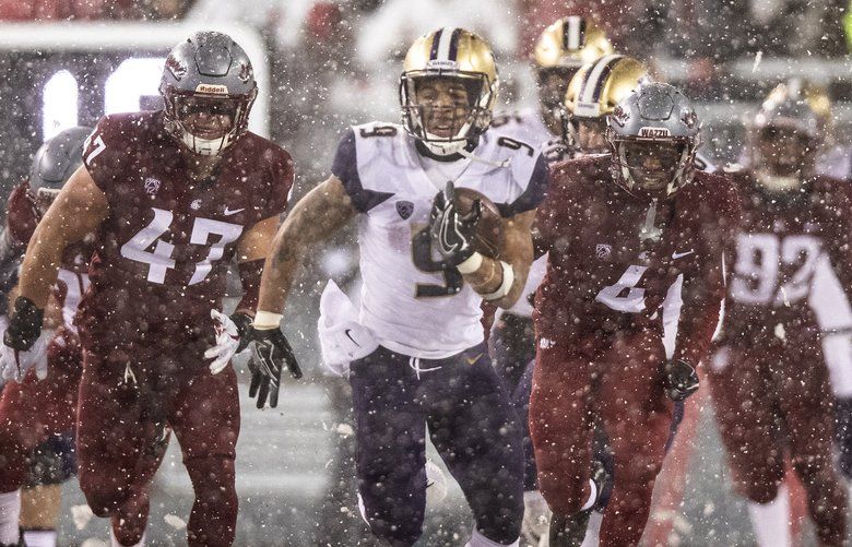 NFL CHAMPIONSHIPS: Neither rain, nor snow, nor gloom of a