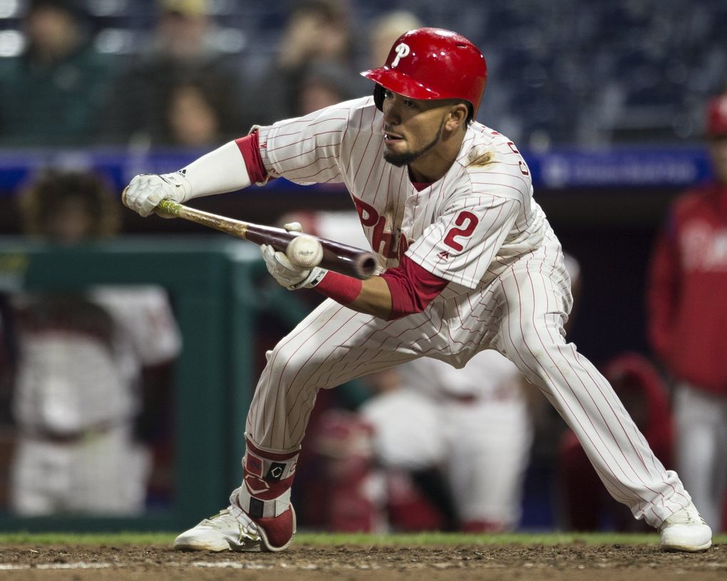J.P. Crawford lays down a bunt for the Phillies in 2018. (Laurence Kesterson / AP)
