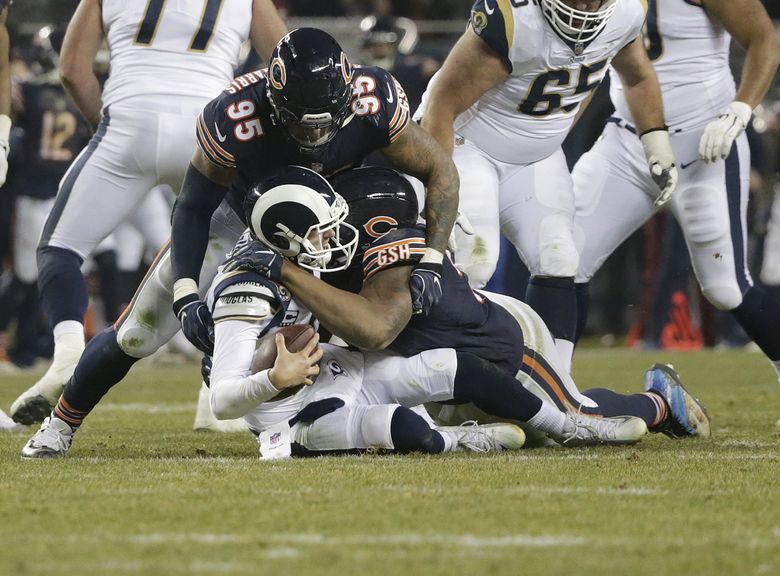 Photo: Los Angeles Rams quarterback Jared Goff and defensive end