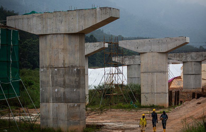 Workers at part of the East Coast Rail Link, a scandal-plagued, now-suspended infrastructure project that was to be part of China’s Belt and Road Initiative, in Bentong, Malaysia, Nov. 17, 2018. The influential consultancy McKinsey advised both the state-owned Chinese company building the railroad and the Malaysian government that approved it. (Lauren DeCicca/The New York Times) XNYT41 XNYT41