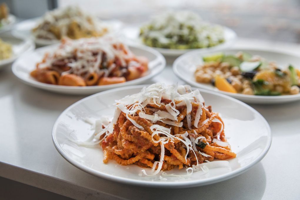 To make this fast-casual concept work during the lunch rush at G.H. Pasta Co., chef Brian Clevenger expects each bowl to be made in seven minutes. Pictured: spaghetti with Bolognese and mascarpone. (Steve Ringman / The Seattle Times)