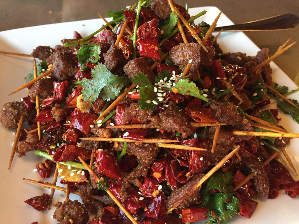 This is Zhen Kee’s “Chef Special Lamb in the Stick”: smoky, chewy, terrific. (Bethany Jean Clement / The Seattle Times)