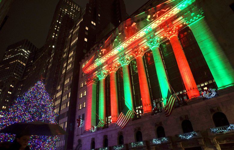 This photo shows the exterior of the New York Stock Exchange on Thursday evening, Dec. 20, 2018. Stocks went into another slide Thursday in what is shaping up as the worst December on Wall Street since the depths of the Great Depression, with prices dragged down by rising fears of a recession somewhere on the horizon. The Dow Jones Industrial Average dropped 464 points, bringing its losses to more than 1,700 since last Friday. (AP Photo/Patrick Sison) NYPS103 NYPS103
