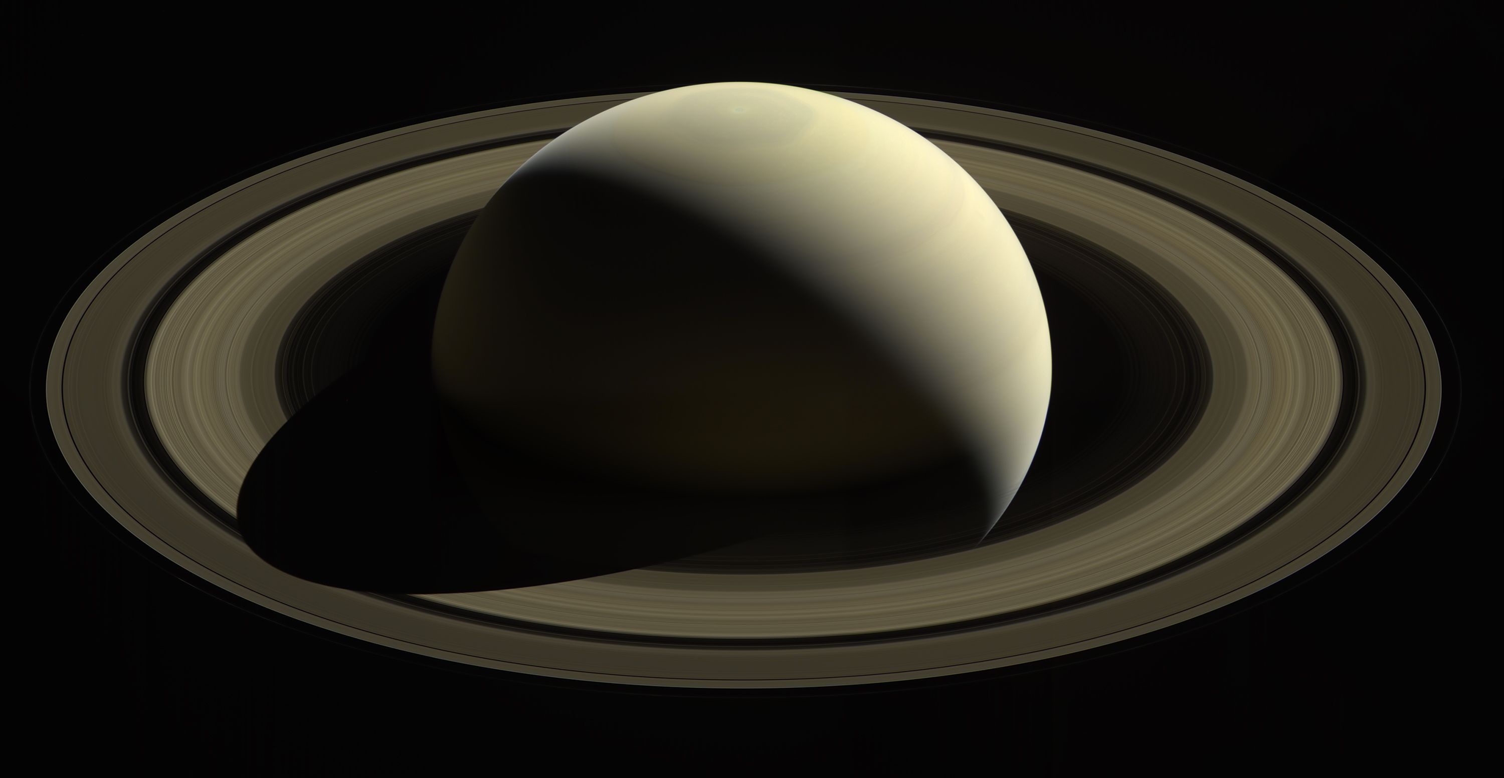 Saturn's mysterious rings & extreme tilt: Former moon may be responsible
