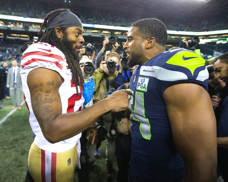 September 17, 2017: Seattle Seahawks cornerback Richard Sherman (25)  adjusts his helmet during a game between the San Francisco 49ers and the Seattle  Seahawks at CenturyLink Field in Seattle, WA on September