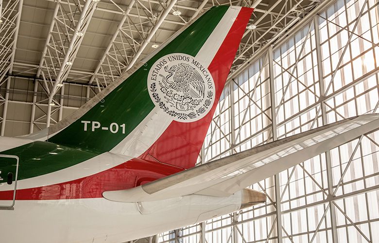 The tail fin featuring the Mexican national emblem is seen on the Mexican Presidential ‘Jose Maria Morelos y Pavon,’ a Boeing Co. 787-8 Dreamliner aircraft, at a hanger in Mexico City, Mexico, on Sunday, Dec. 2, 2018. Mexican President?Andres Manuel Lopez Obrador?is fulfilling a campaign promise by selling the Boeing 787 Dreamliner that?s transported former President?Enrique Pena Nieto?since 2016. Photographer: Alejandro Cegarra/Bloomberg