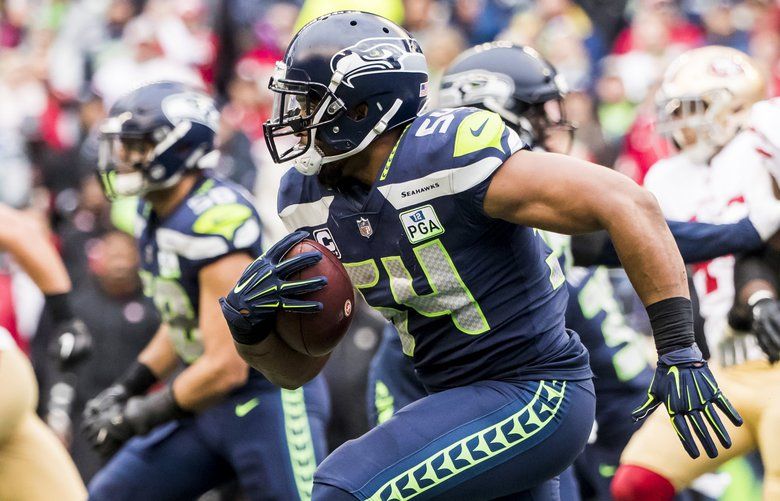 September 17, 2017: Seattle Seahawks linebacker Bobby Wagner (54) runs with  the ball after an interception during a game between the San Francisco  49ers and the Seattle Seahawks at CenturyLink Field in