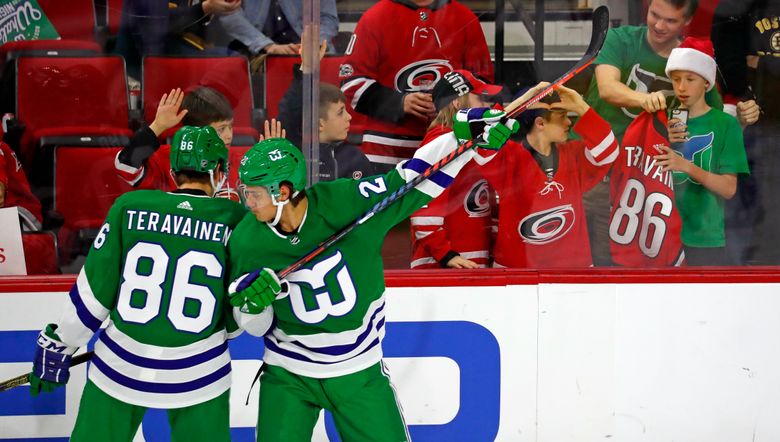 Aho leads Carolina past Bruins 5-3 on Whalers Night