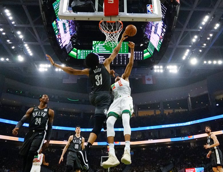 giannis antetokounmpo dunks from outside the three point line