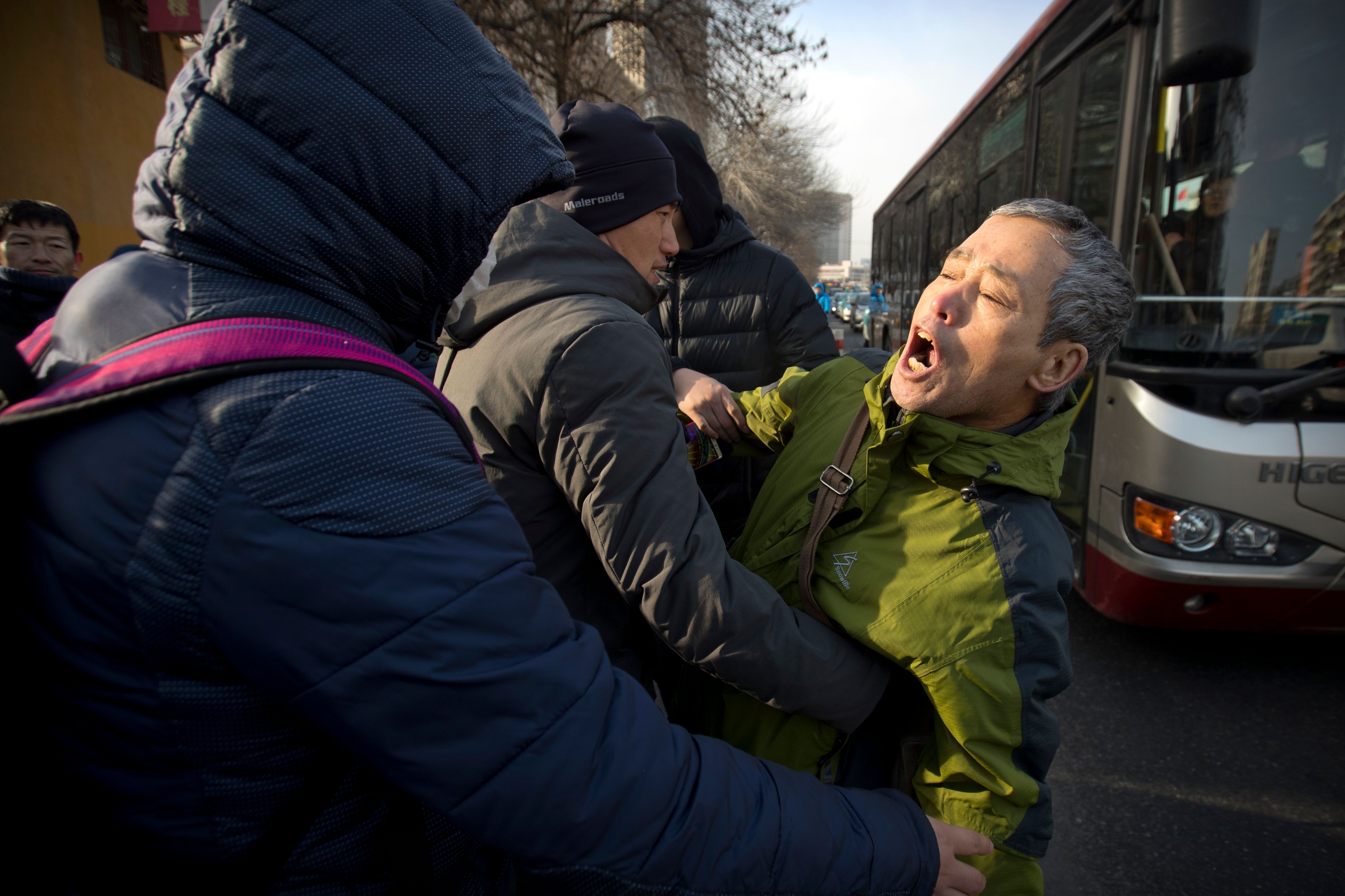 Prominent Chinese rights lawyer tried in closed proceedings The