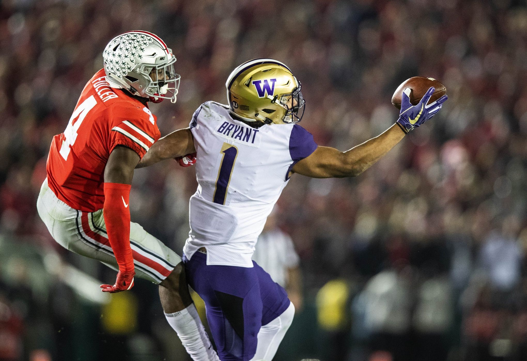 Be Water': Bryant Dives In, Submerges with Husky Football Honors