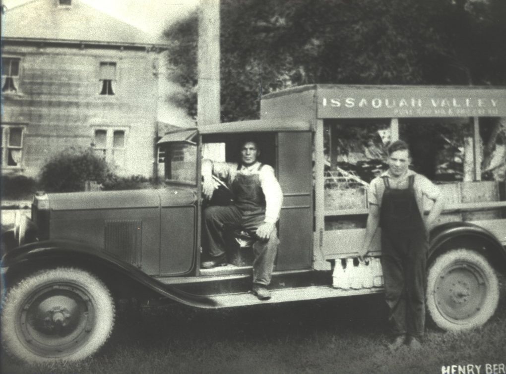 Henry Bergsma Sr., left, and his son, Jack Bergsma, as they deliver milk in 1939 or 1940 in Issaquah. From 1922 to 1969, the family owned the Issaquah Valley Dairy. (Issaquah History Museums)