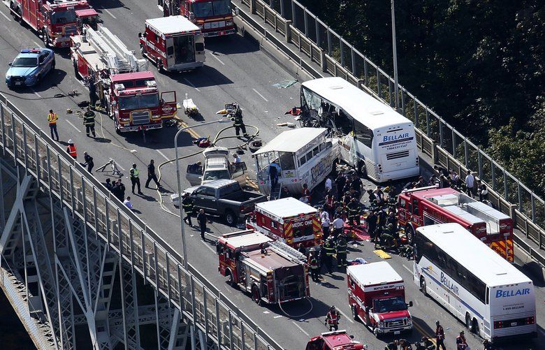 Ride the Ducks vehicle collides with charter bus on Aurora Bridge, Thurs., Sept. 24, 2015, in Seattle.