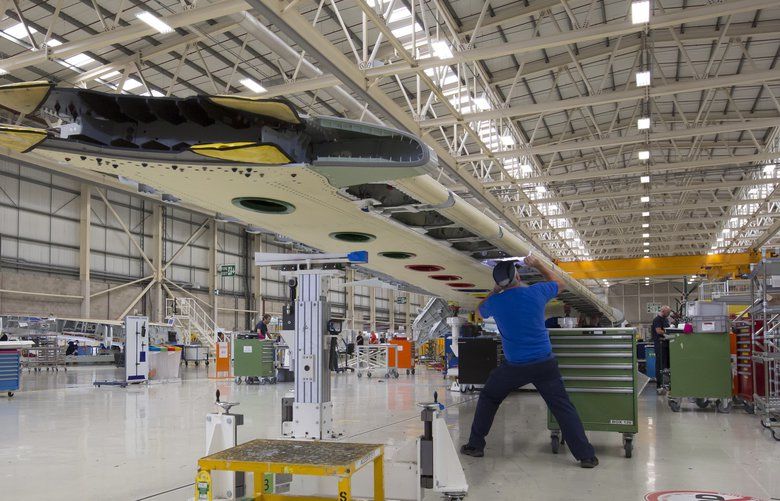 Picture shows a view inside the A350 wing manufacturing facility at the Airbus plant in Broughton, north Wales, where Airbus puts together the composite wings of the A350 and is automating assembly of the metal wings on its A320, A330 and A380 jets. July 19, 2016. (Jon Super)