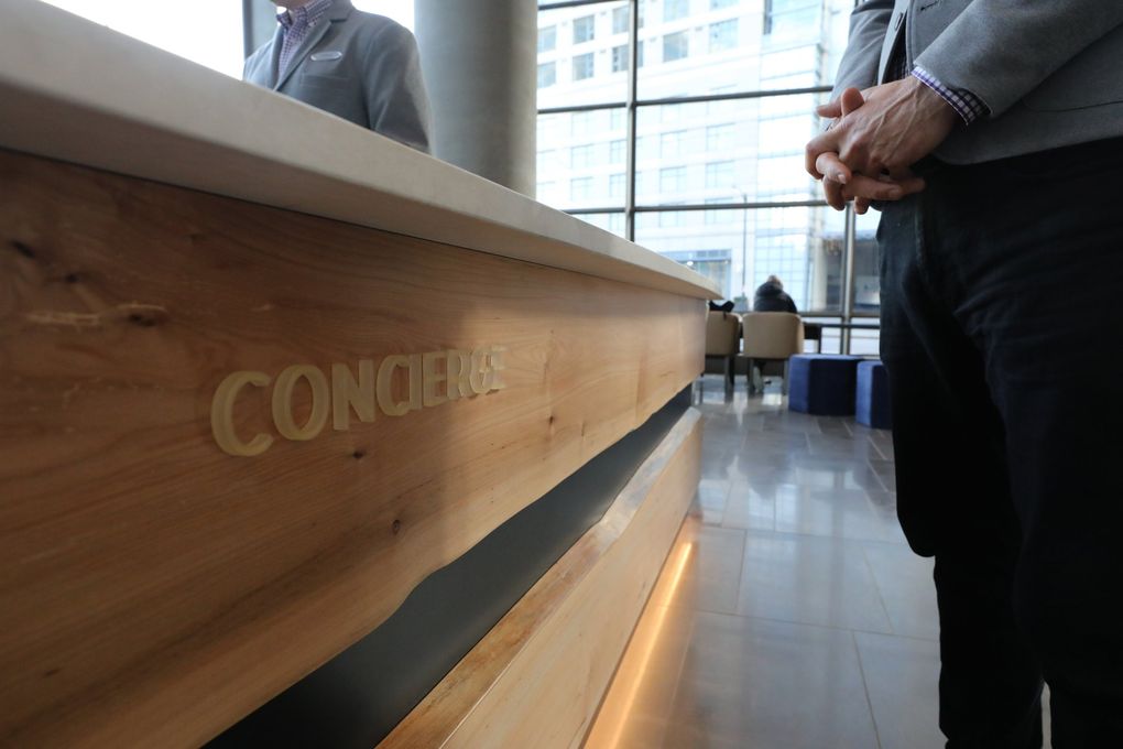 The concierge desk is the “mission control” at the Hyatt Regency. “I know the city more and more every day,” says lead concierge Chuck Watts. (Alan Berner / The Seattle Times)