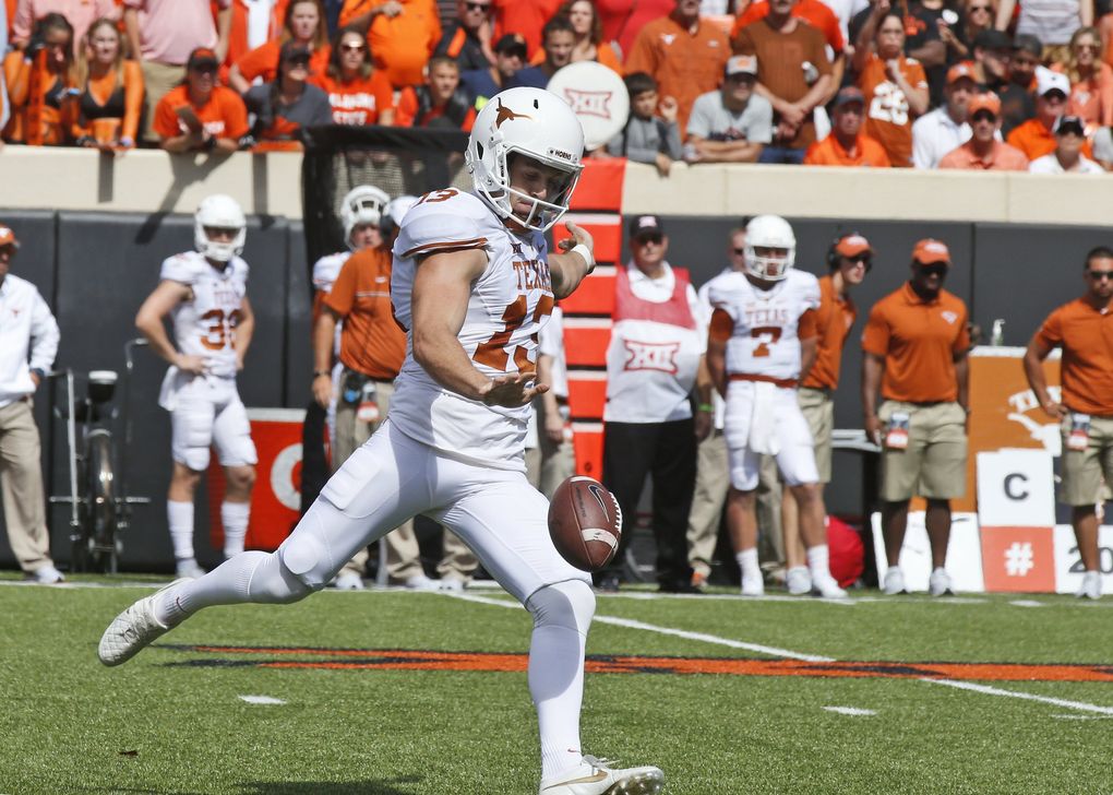 Michael Dickson grew up in Australia playing Aussie rules football, but transitioned to punting after he went undrafted in the 2014 AFL draft. (AP Photo/Sue Ogrocki)