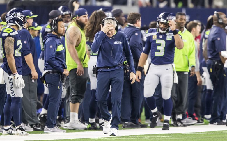 A fan waves a Dallas Cowboys flag before a preseason NFL football game  between the Seattle Seahawks and the Cowboys, Saturday, Aug. 19, 2023, in  Seattle. (AP Photo/Lindsey Wasson Stock Photo - Alamy